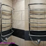 Недорога електрична рушникосушка в туалеті