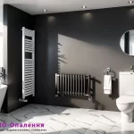 Рушникосушка біла в дизайні сучасної ванної кімнати