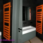 Рушникосушка дизайнерська плоска, помаранчева.