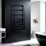 Рушникосушка електрична драбинка в інтер'єрі ванної кімнати